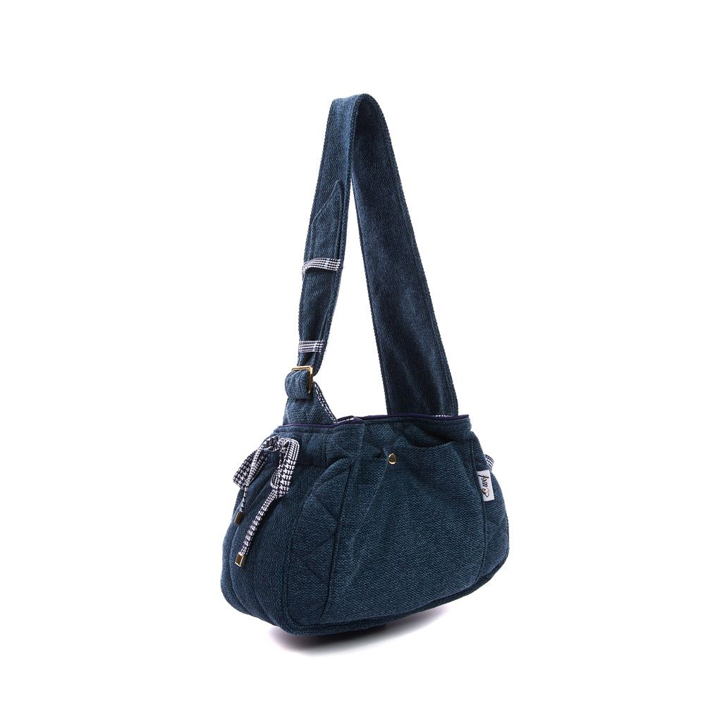 Bolso bandolera azul jaspeado con interior en pata de gallo azul lado Bolso bandolera azul jaspeado con interior en pata de gallo azul lado