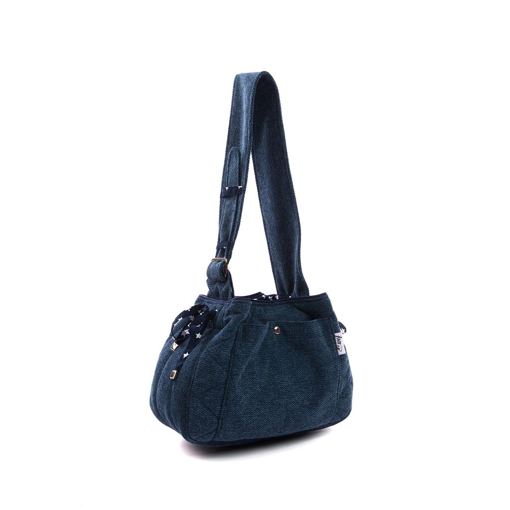 Bolso bandolera azul jaspeado con interior estrellas lado Bolso bandolera azul jaspeado con interior estrellas lado