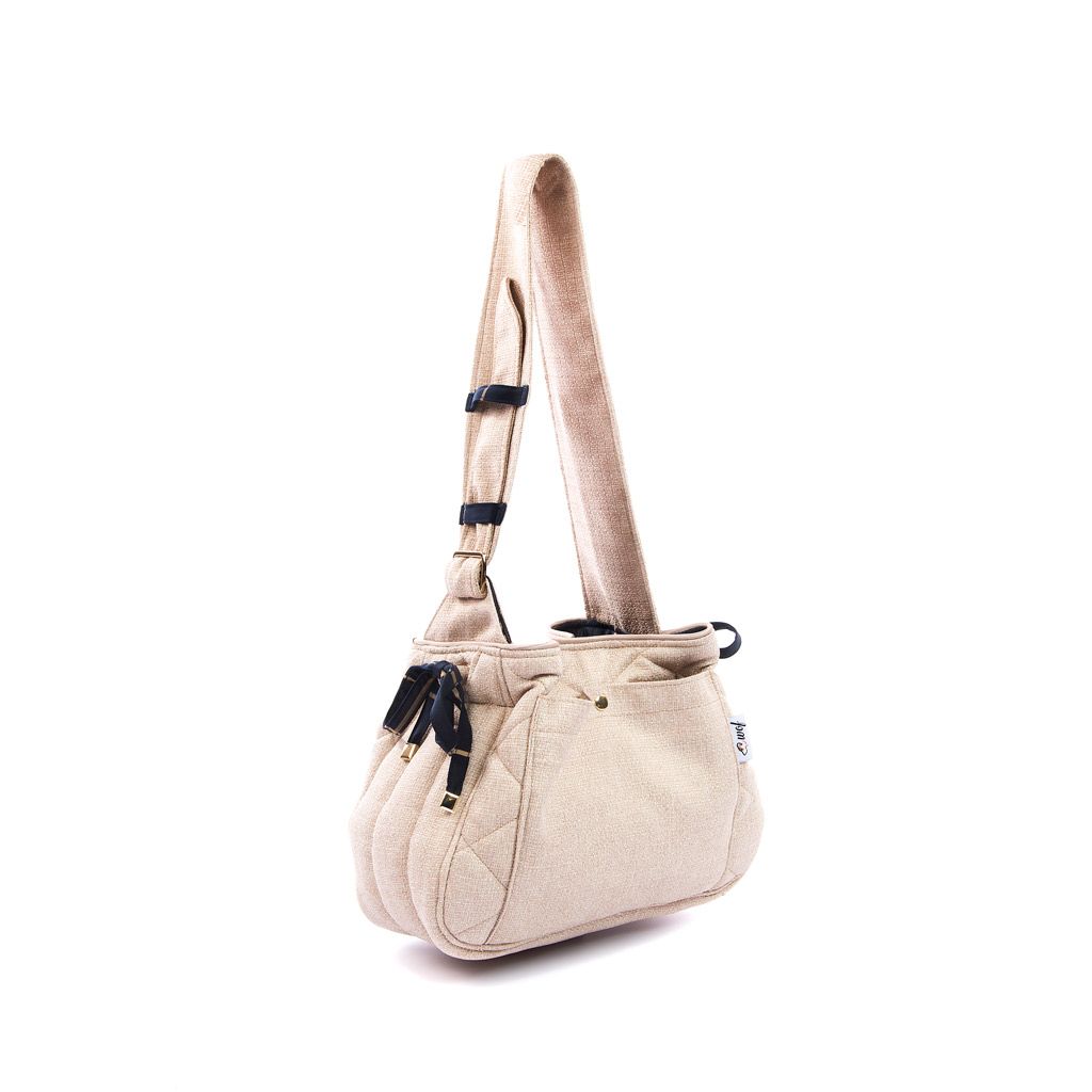 Bolso bandolera beige interior azul oscuro cuadros marrones lado Bolso bandolera beige interior azul oscuro cuadros marrones lado