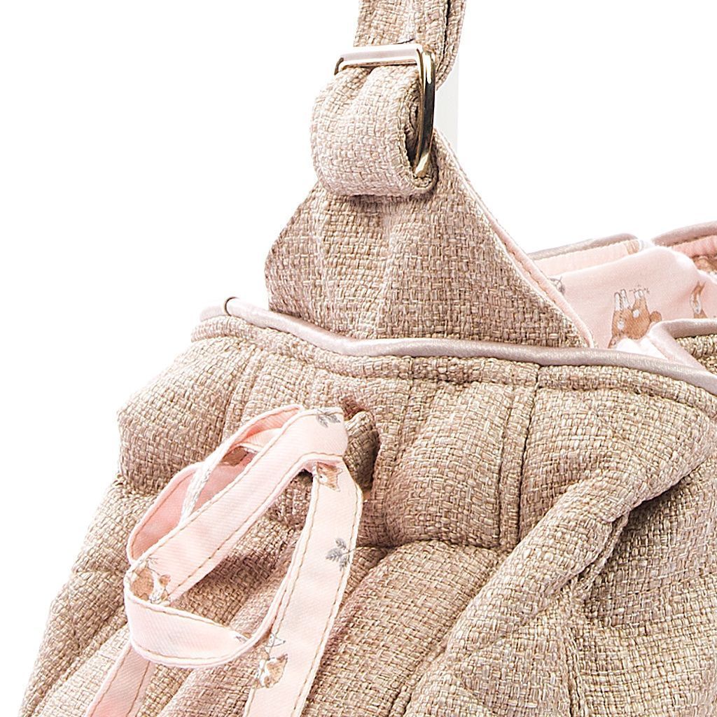 Bolso bandolera beige interior perritos detalle 1 Bolso bandolera beige interior perritos detalle 1