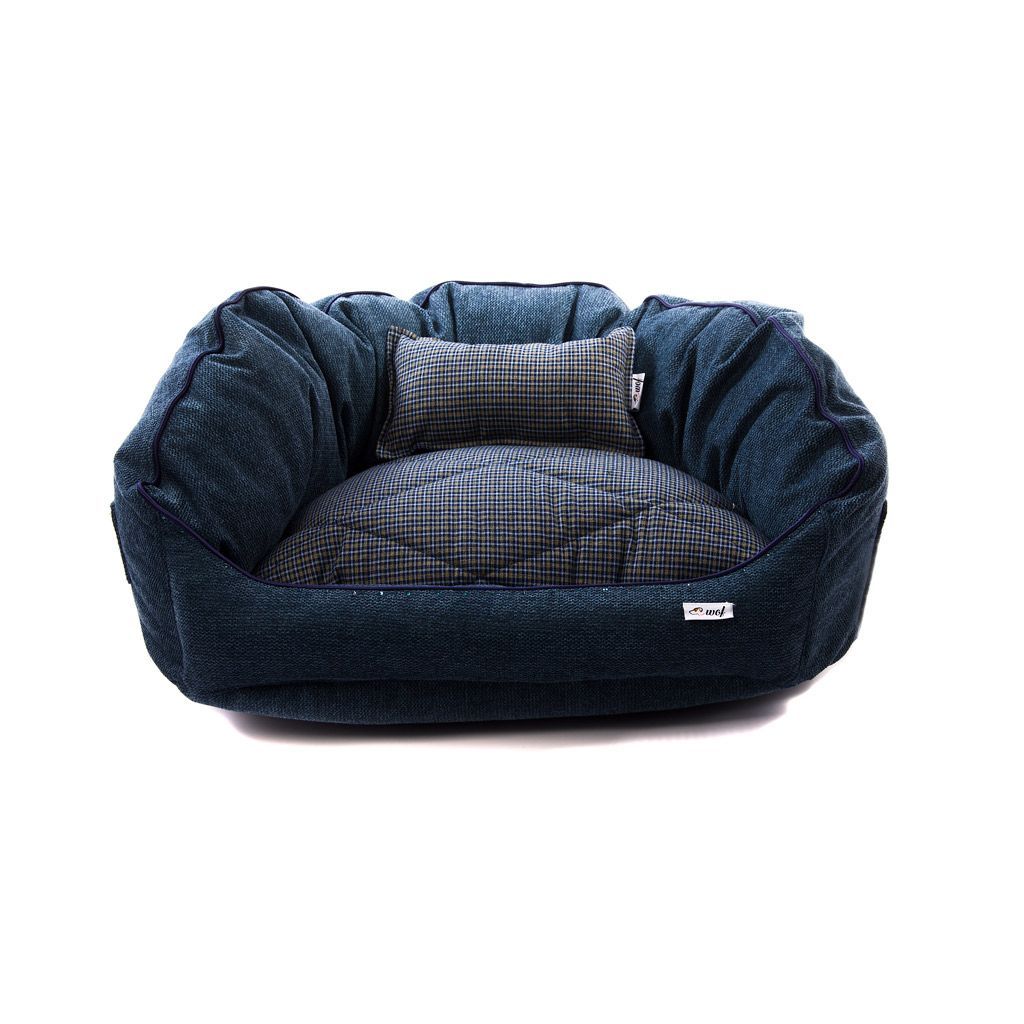 Cama oval azul marino jaspeado con cojin a cuadros Cama oval azul marino jaspeado con cojin a cuadros