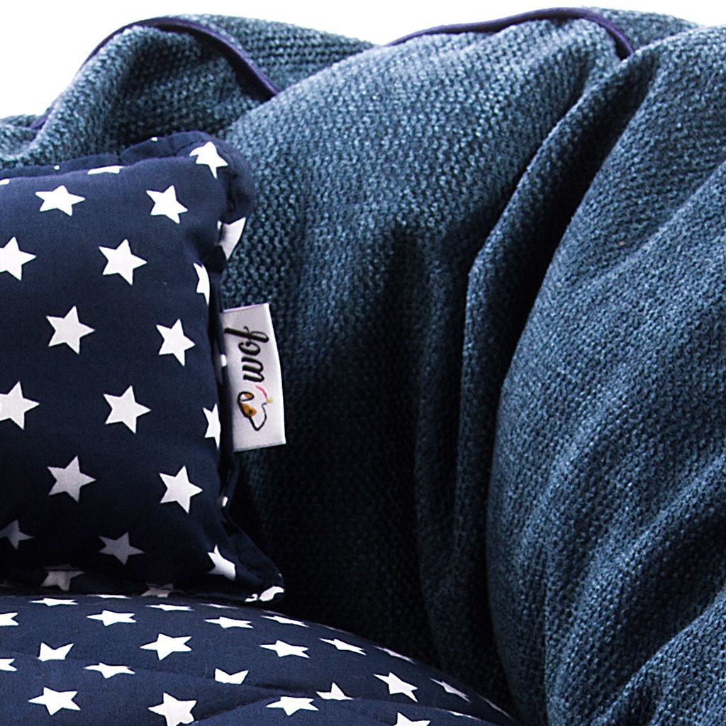 Cama oval azul marino jaspeado con cojin azul con estrellitas detalle 2 Cama oval azul marino jaspeado con cojin azul con estrellitas detalle 2